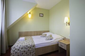 Фото номера Трехместный номер Отель Ski Hotel г. Пивнична 4